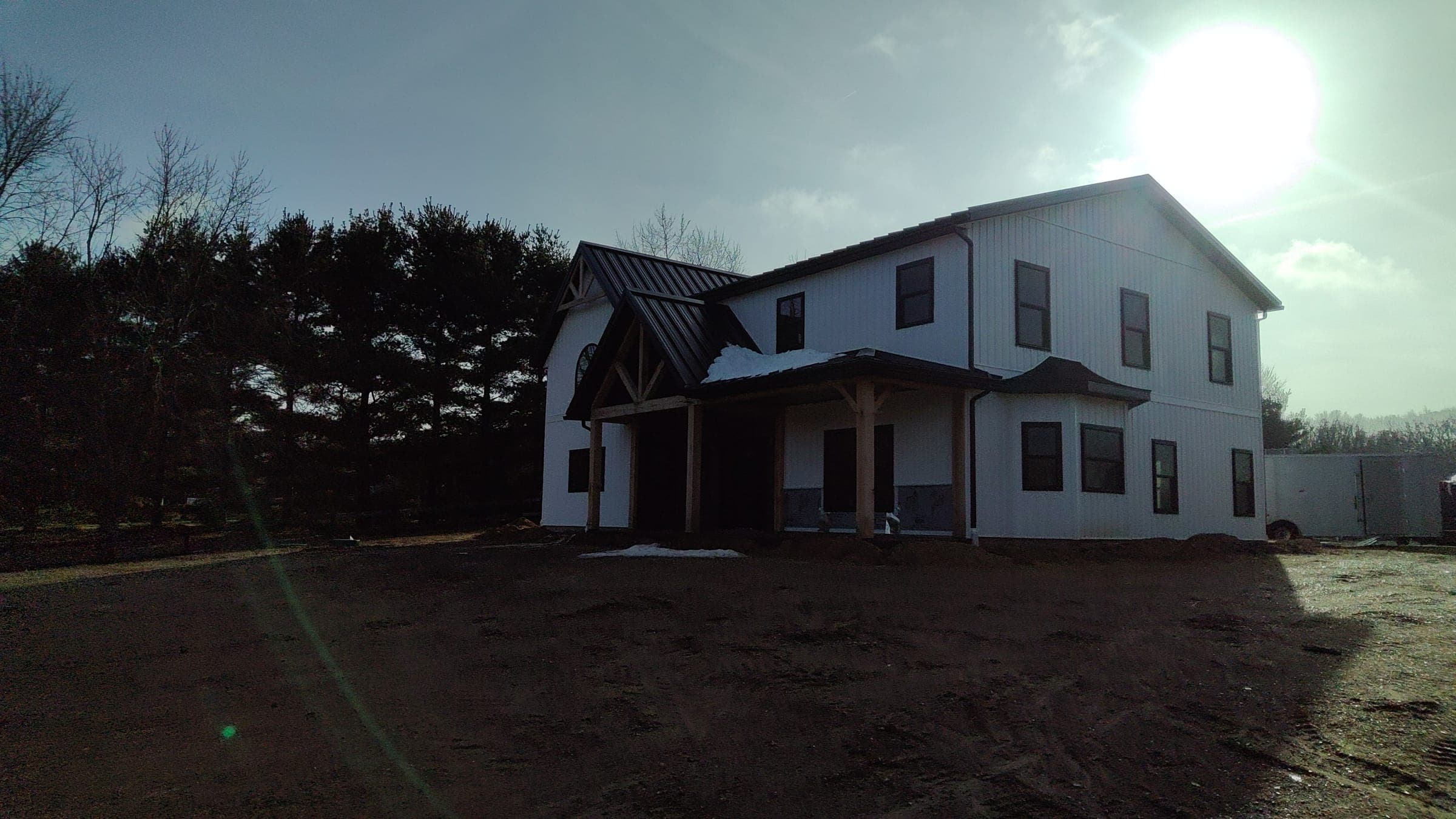 Silhouette view of modern farmhouse built by Starlite Builders in Northern Indiana